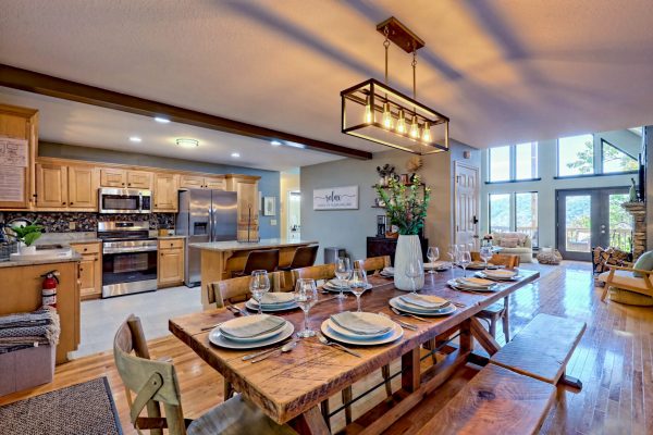 Dine and enjoy our kitchen with farmhouse table, pantry, coffee bar and dishwasher.
